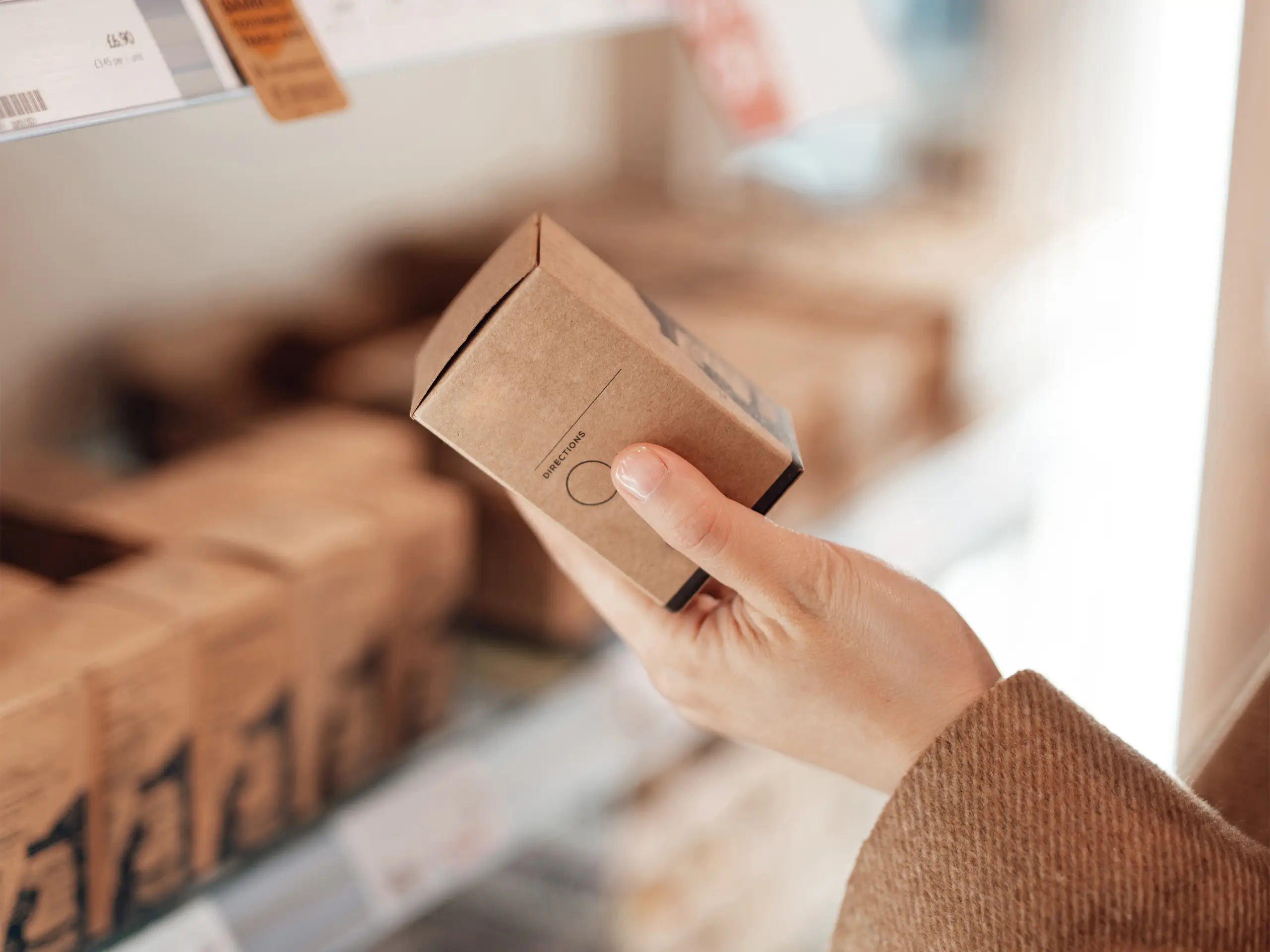 Young woman shopping eco friendly personal skincare products in zero waste store. Zero waste concept. Creating a plastic free planet.